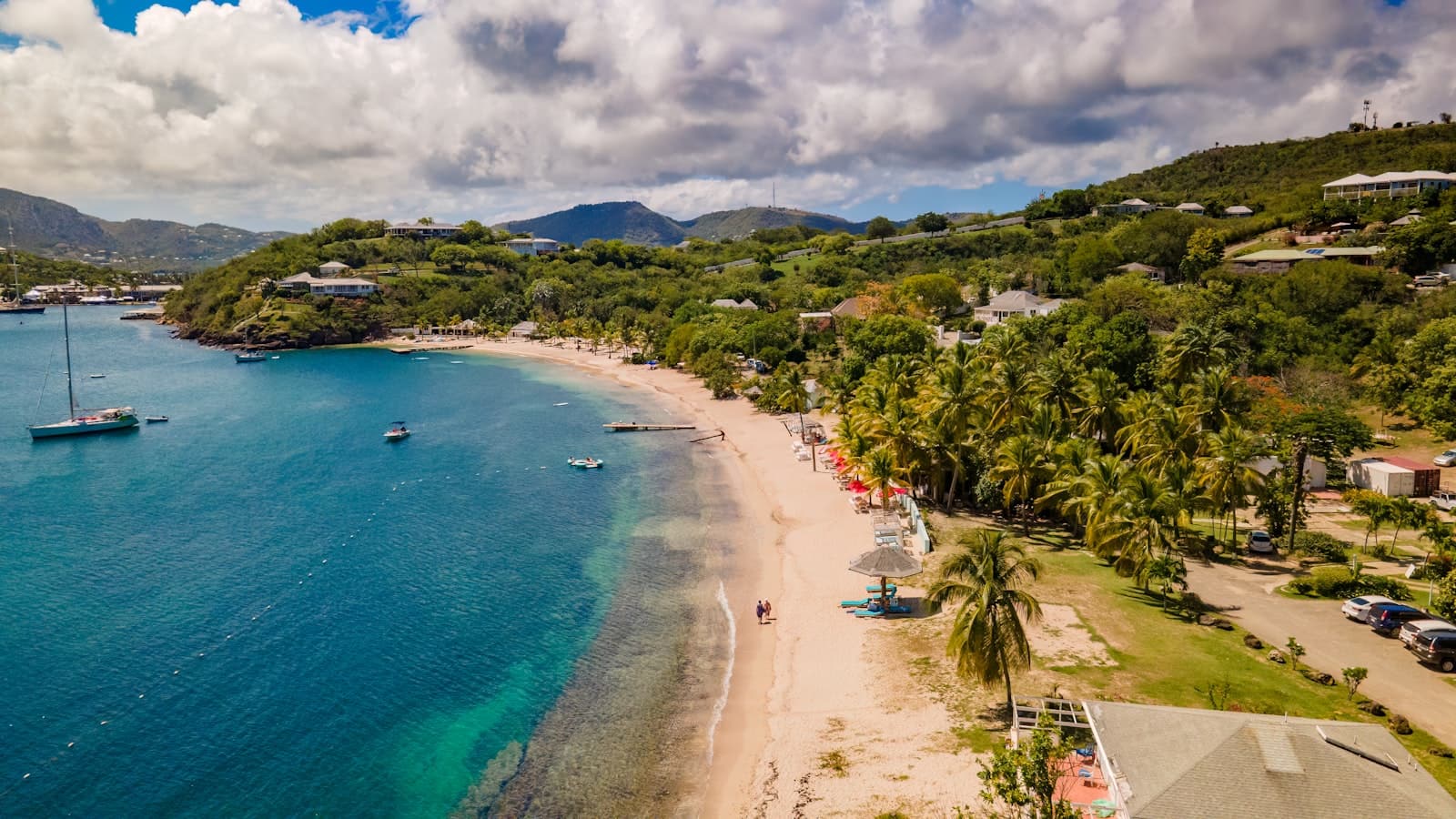 A turquoise beach with sailboats, Antigua and Barbuda